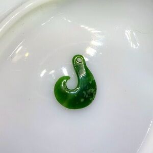 Hand carved jade pendant